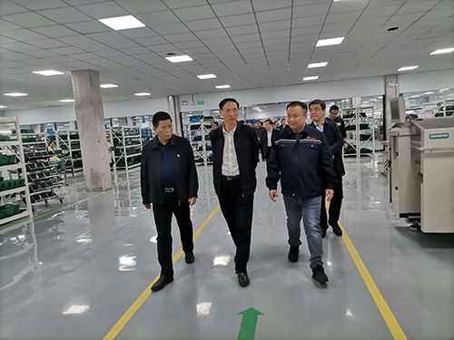 Warmly welcome Comrade Zhang Guowei, Secretary of the municipal Party committee, and his party to our company